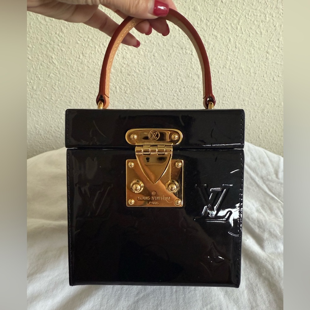 louis vuitton bleecker box bag in black monogram vernis leather.